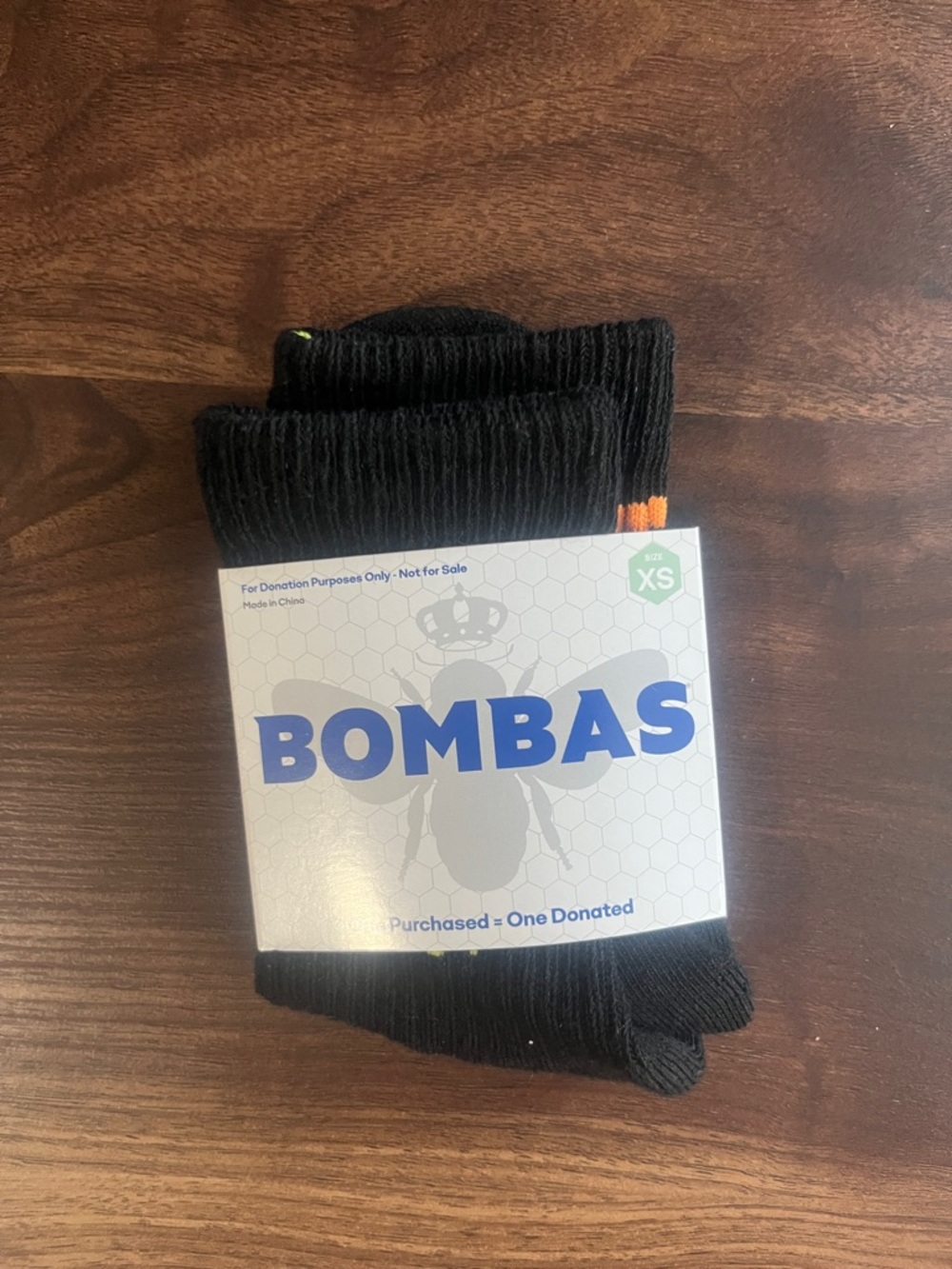Bombas Black Crew Socks with Orange and Green Accents